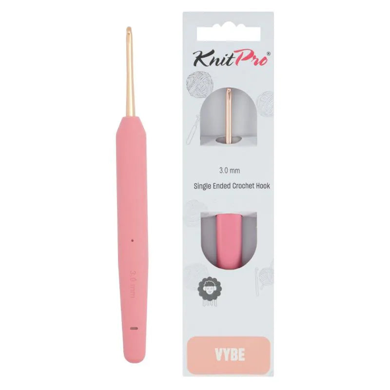 KnitPro Vybe Single Crochet Hook 3mm - A pink single-ended crochet hook with a gold-toned tip shown next to its retail packaging. The packaging is white with a clear window displaying the hook and features the KnitPro brand and the name 'VYBE' at the bottom.