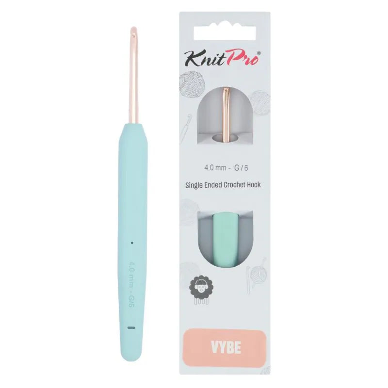 A KnitPro Vybe single ended crochet hook 4mm in the colorway 'Vybe' shown next to its retail packaging. The crochet hook features a light pastel blue handle and a rose gold metal tip.