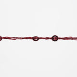 Lang Yarns Paillettes – 25g / 112m – Burgundy (0062) – yarn texture