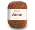 A single ball of yarn Circulo ANNE - 100% mercerized Cotton Yarn, 500m / 147g - wrapped with a white paper label. The yarn is a warm, heathered medium brown color, and the background is a clean white studio setting.
