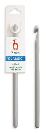 A 7 mm crochet hook in its original white retail packaging, shown alongside the uncapped hook on a plain white background. The hook is silver-colored metal with a curved tip, and the packaging features the brand name 'Pont' and the text '7 mm CLASSIC'.