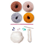 Oliver Doll Kit from Circulo with vibrant yarn and pattern.