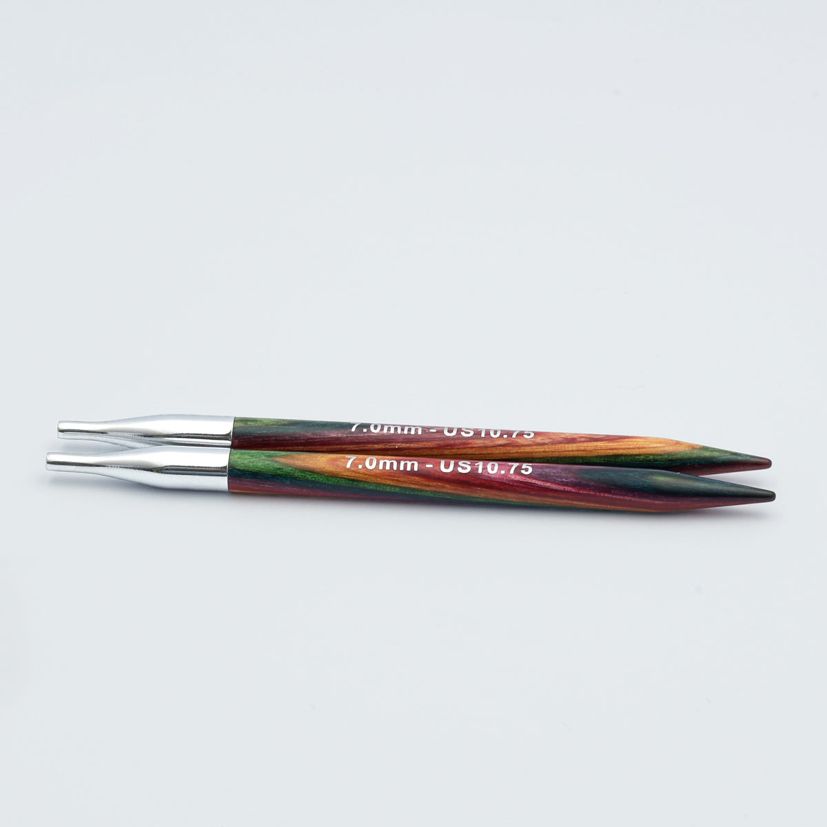 Knitpro-symfonie-2-interchangeable-needle-tips-special-13cm - woooden  7.0mm circular knitting needles with metallic silver tips and colorful marbled handles in green, orange, and red, shown on a light gray background.